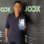 Dennis Hau, Head of International Product Centre, International Business Group Presenting JOOX, the latest Music Streaming Application with Localised Curated Hits 2 (Custom)